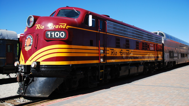 Red and yellow locomotive on the Rio Grande Scenic Railway.