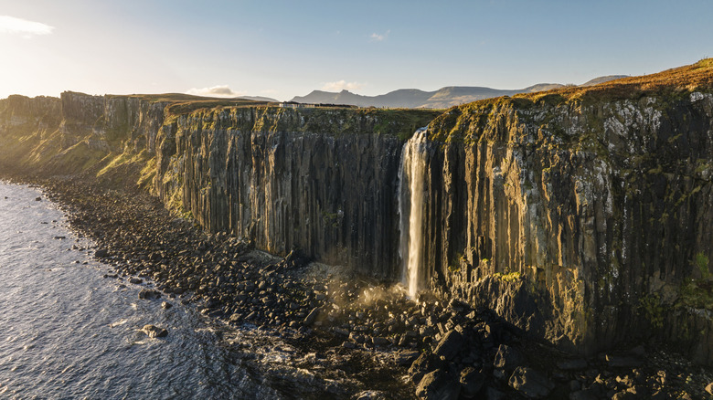 Sunset view of Mealt Falls and Kilt Rock, Scotland