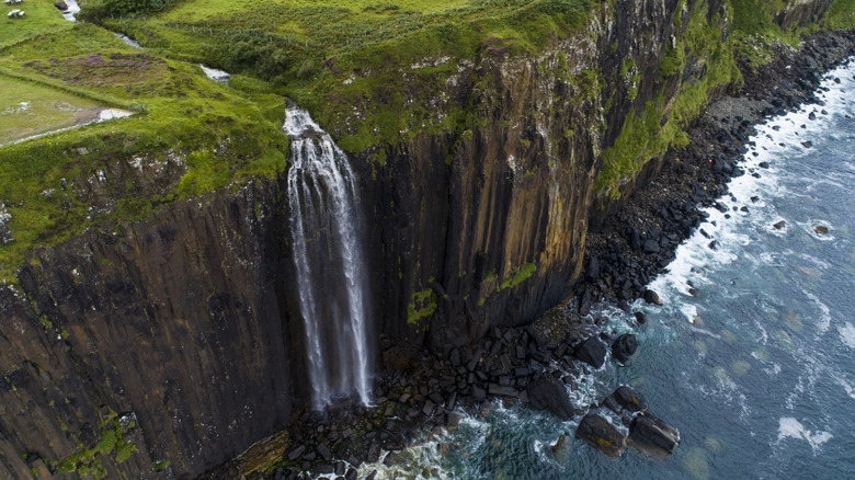 Oceanside waterfall in Mealt Falls, Scotland