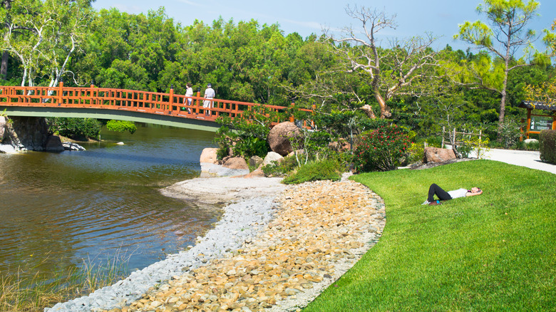 Arched bridge pond perimeter Morikami Museum