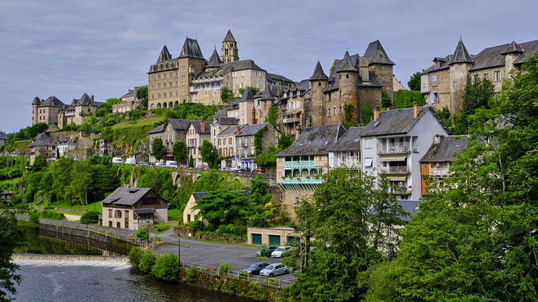 The village of Uzerche on the banks of the Vezere River