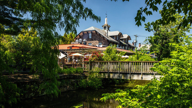 River view with bridge leading to building in Lambertville, New Jersey