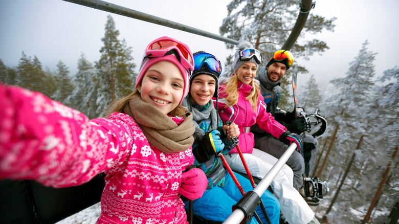 Family on a ski lift 