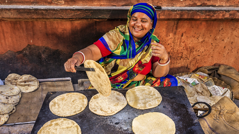 street food vendor making chapati