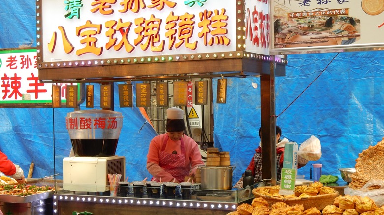 street vendor with Chinese sign