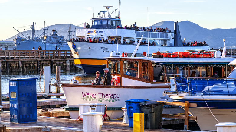 boat passengers drinking wine