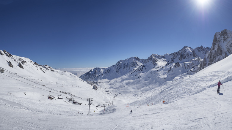 People downhill skiing in the French Pyrenees