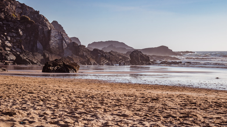 view of rocky bluffs from beach