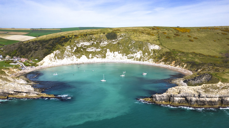 horseshoe-shaped bay with turquoise sea