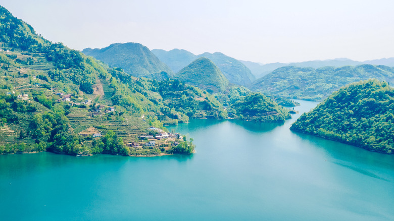 Green mountains surrounding the Qingjiang River in China's Enshi Prefecture.