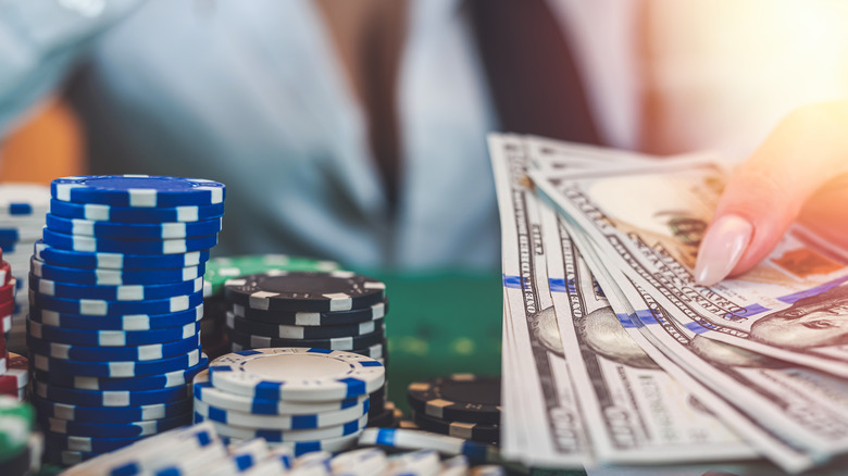 Exchanging cash for chips at a casino table