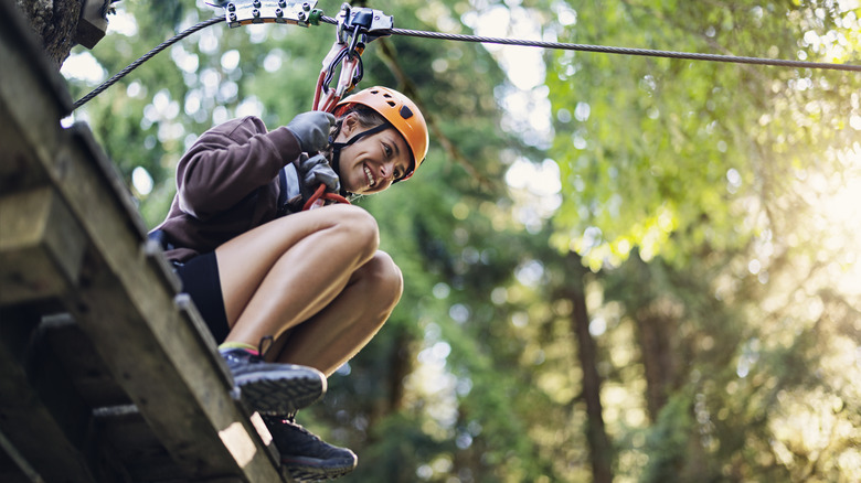 Woman about to zip line
