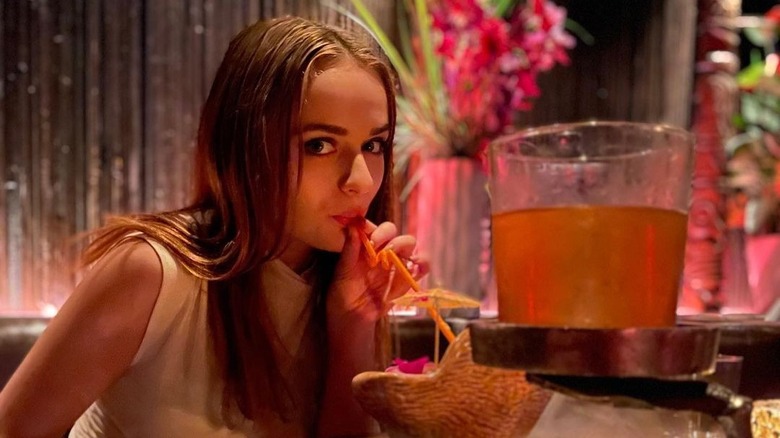 Joey King with a cocktail at Three Dots