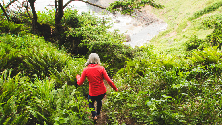 Woman hiking at Ecola State Park 
