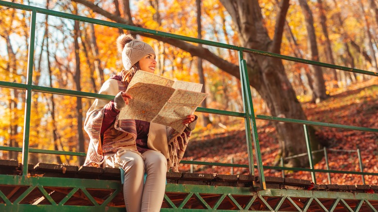 Woman examining a map