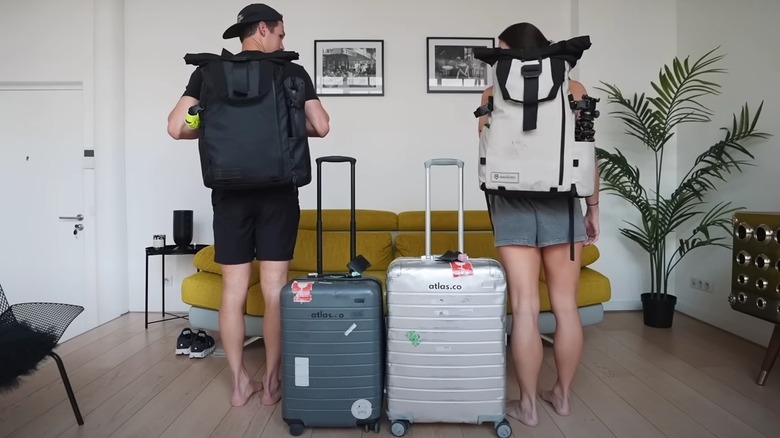 Kara and Nate with luggage