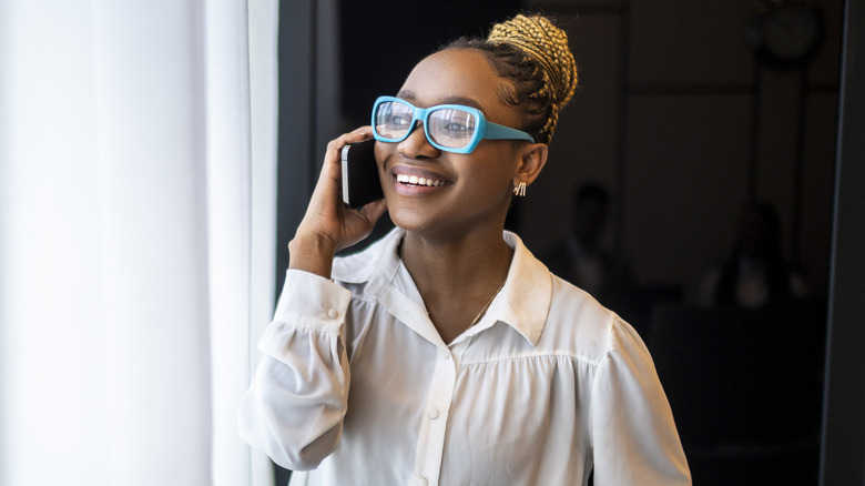 Smiling woman on the phone