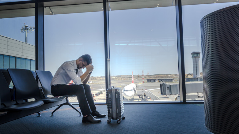 Man dealing with airport anxiety
