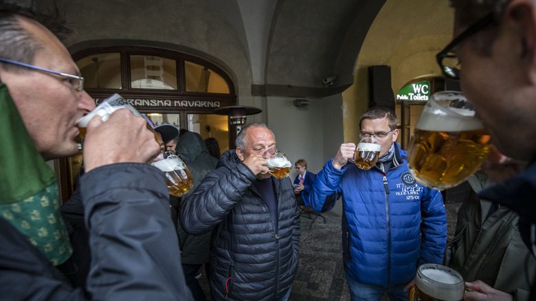 Friends drinking Czech beer Prague