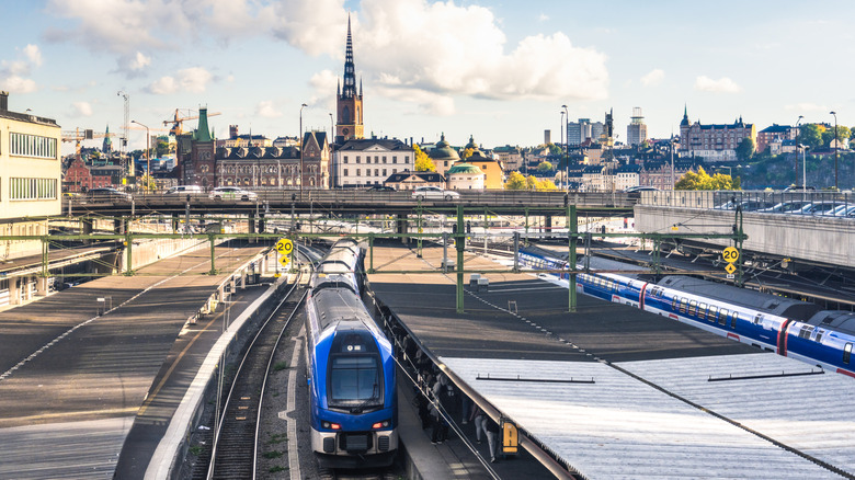 A train pulls away from downtown Stockholm, Sweden