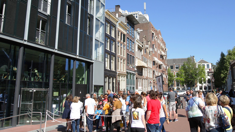 Tourists in line for a museum