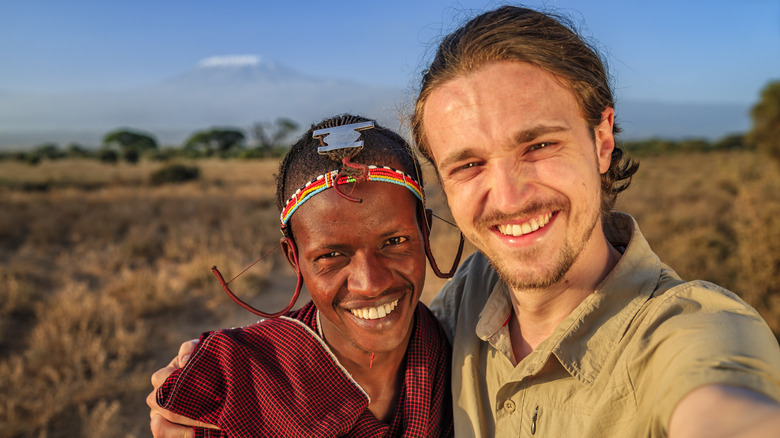 Tourist selfie with Maasai man