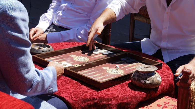 men playing backgammon