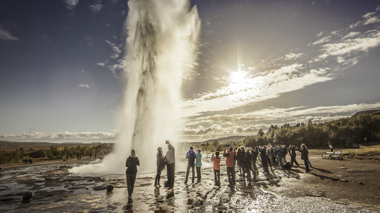 tourists visiting Strokkur geyser