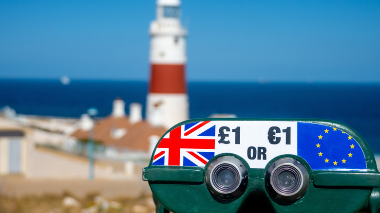 A sign with Gibraltar prices in both pounds and Euros.