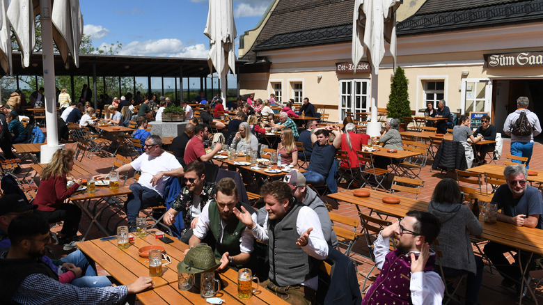 People drinking in beer garden