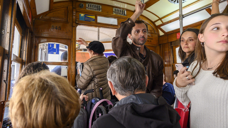 people on a Lisbon tram