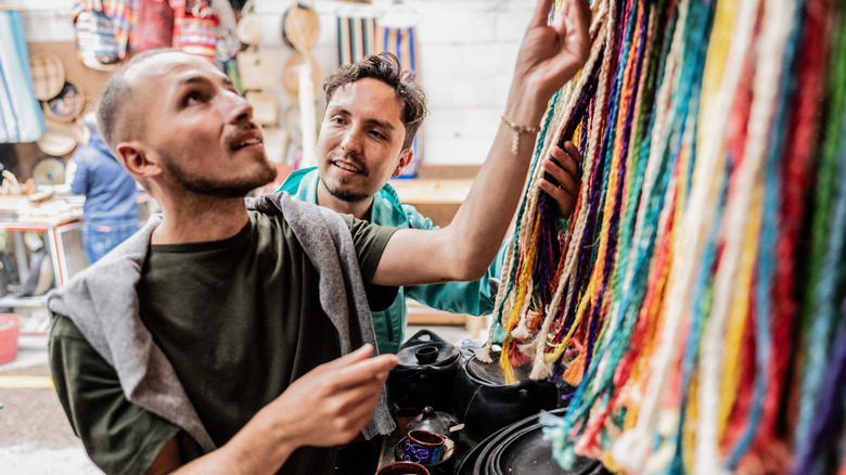 Couple looking at souvenirs