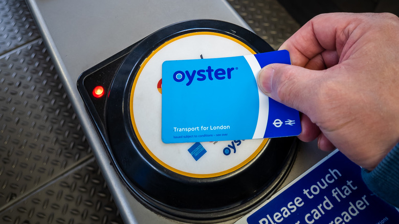 Passenger tapping an Oyster card