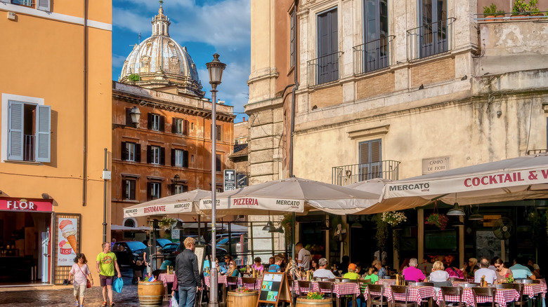 People eating at restaurant in Italy