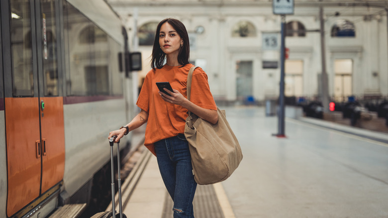 Woman at train station