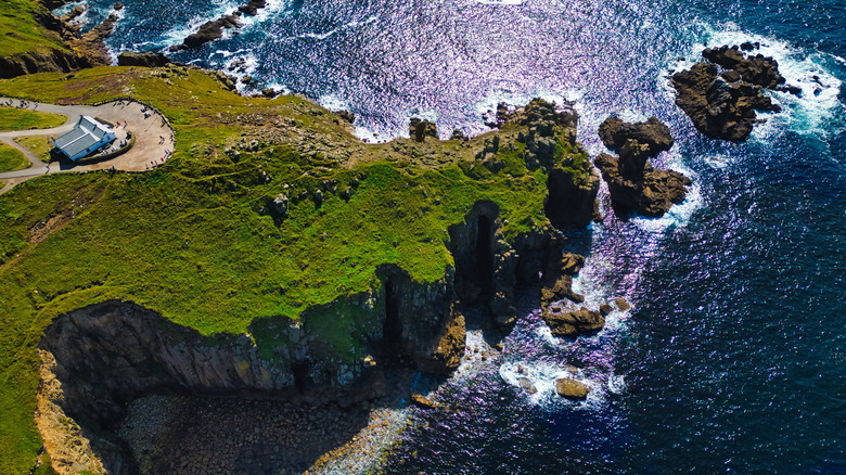 Aerial view of cliffs and sea at Land's End in England