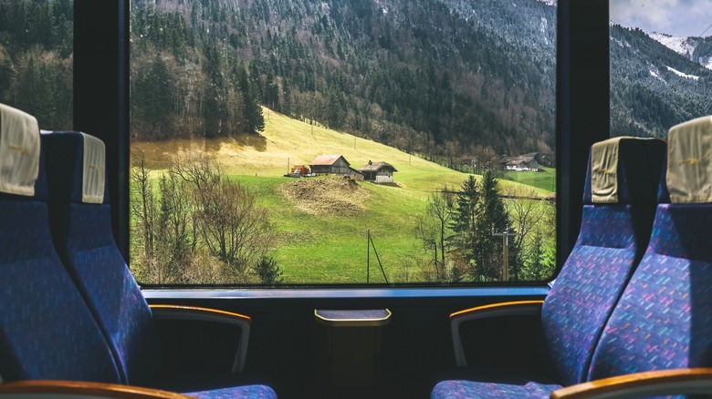 View of Swiss countryside from inside a train