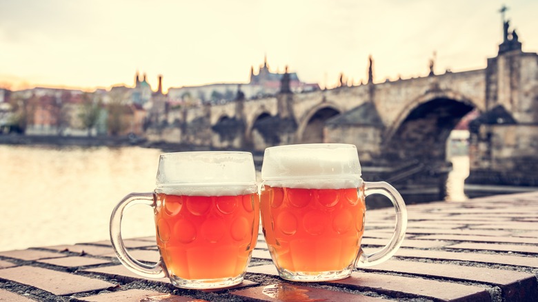 Beer glasses with Charles Bridge views