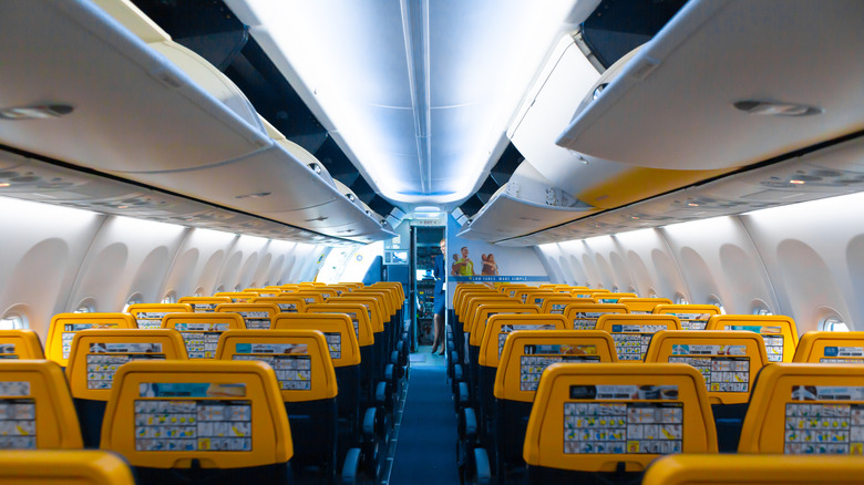 The blue and yellow Ryanair aircraft interior.