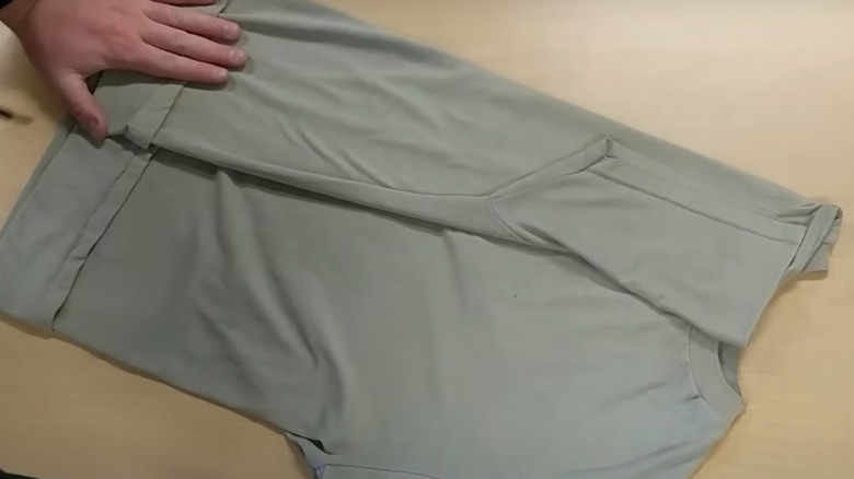 man demonstrating Ranger Roll folds