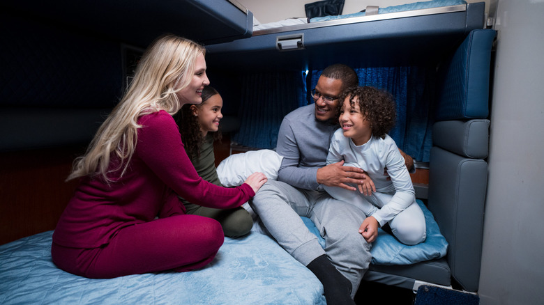 Family in roomette on train