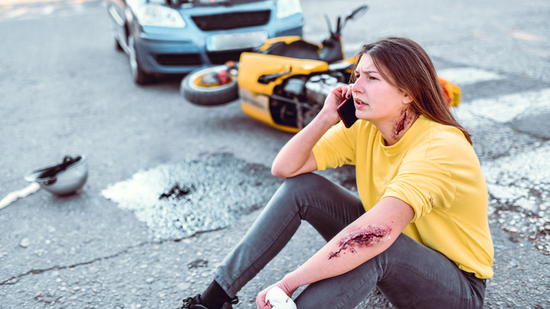 injured pedestrian on phone