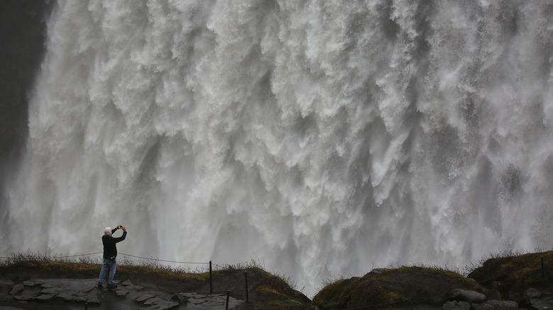 Dettifoss scale of waterfall person