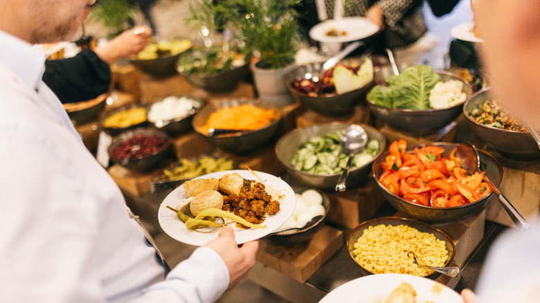 man at a buffet