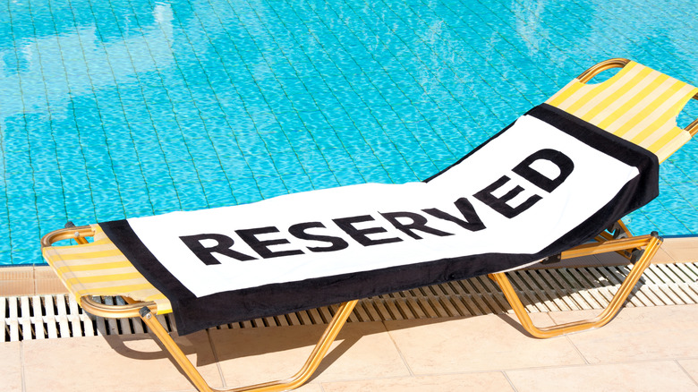 Reserved towel on pool chair