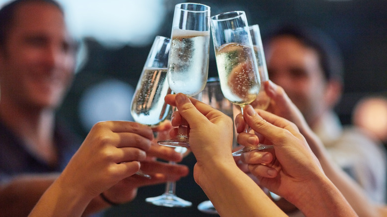 friends drinking champagne together