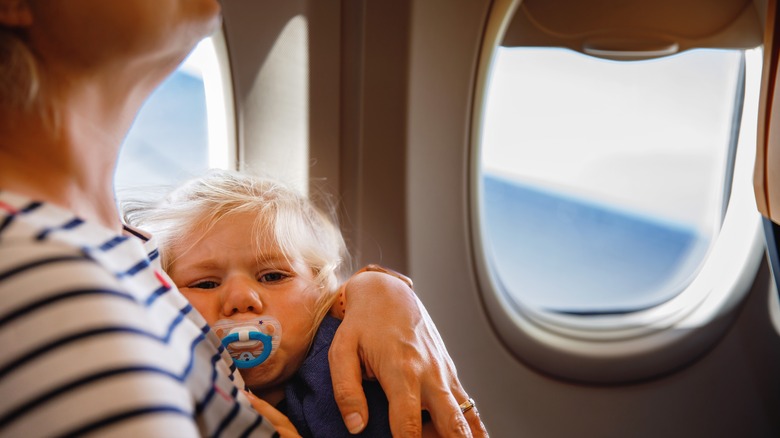 Upset baby on plane