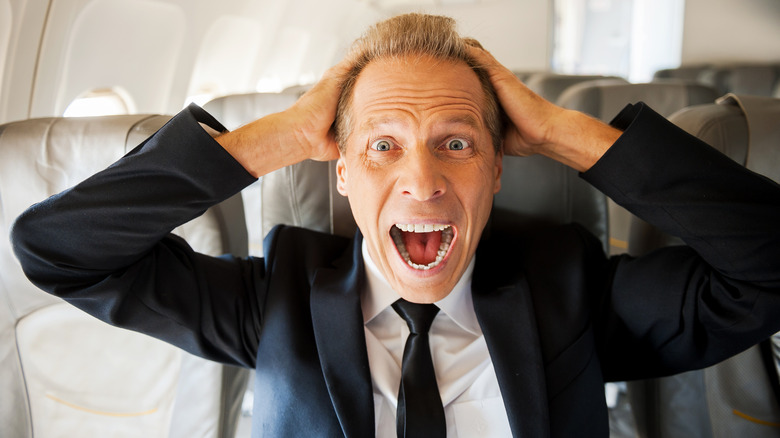 Man yelling on airplane