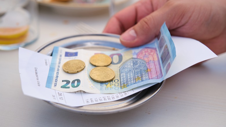 Close-up of a restaurant bill with euros