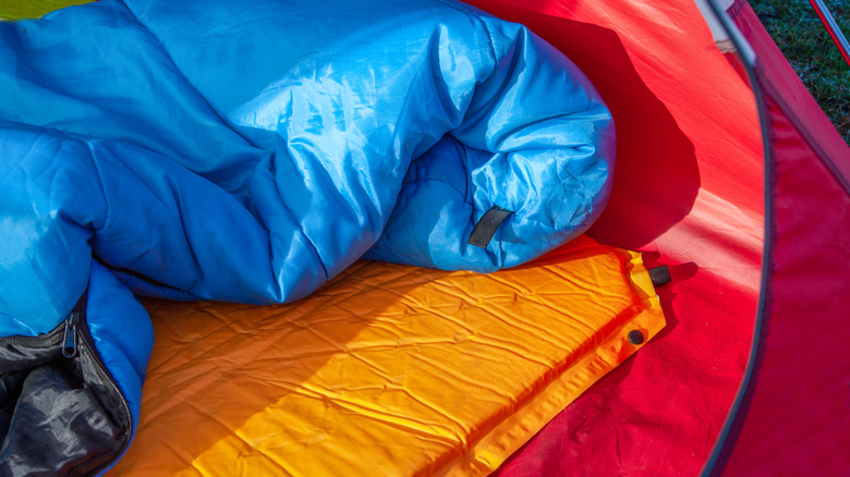 Sleeping bag and pad in a tent